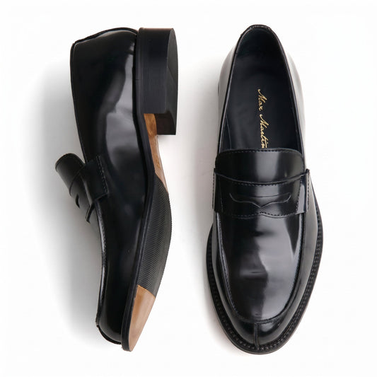 Mocasín desgastado negro